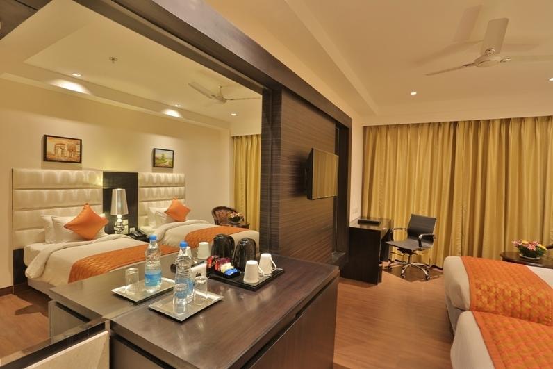 Una Smart Mandarin Panchkula Quarto foto